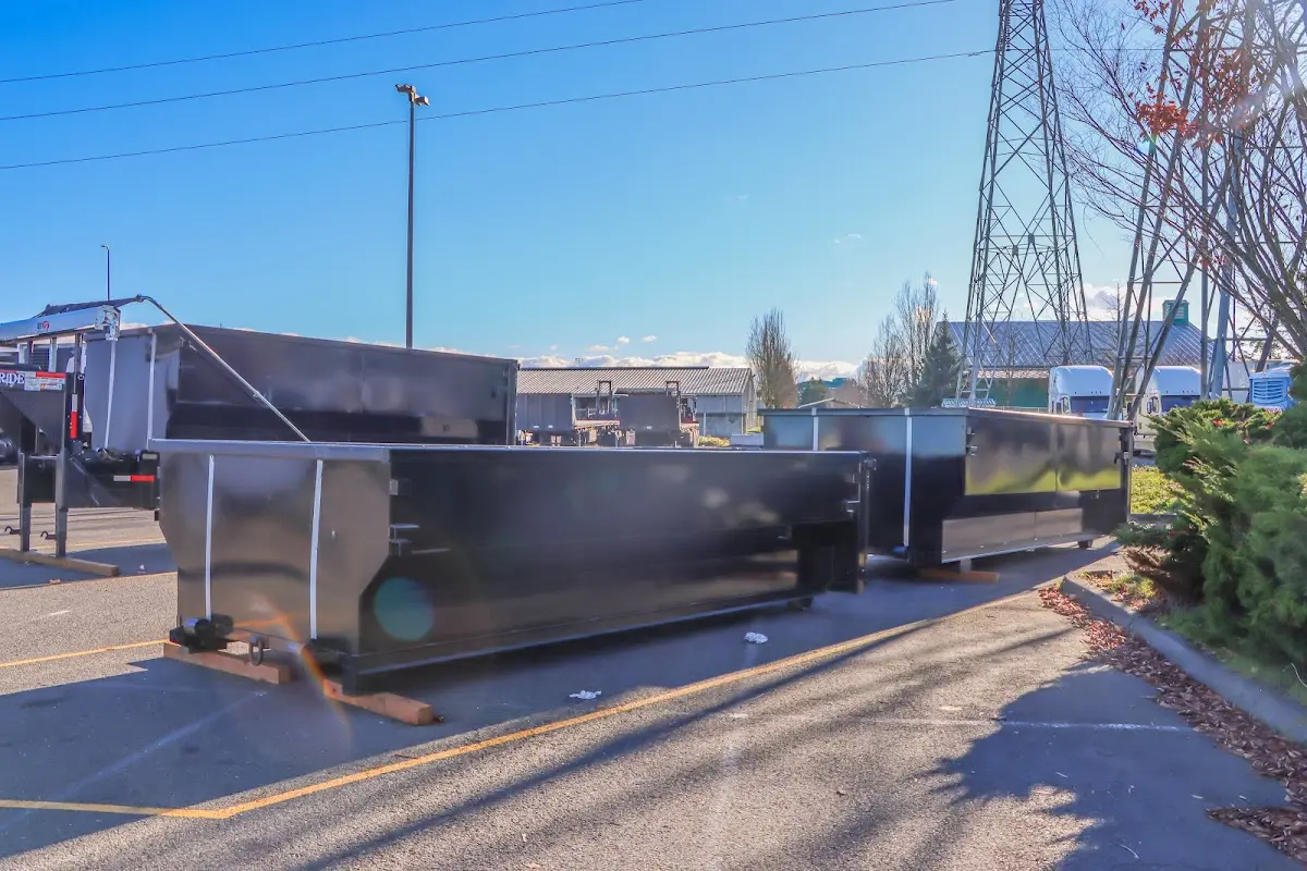 Roll-off dumpster ready for waste disposal at job site for Demolition Dumpster Rental in West Miami